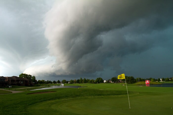 Storm clouds gather over the ninth hole during the fourth round of the LPGA State Farm Classic at Panther Creek Country Club on June 13, 2010 in Springfield, Illinois. (Photo: AFP)