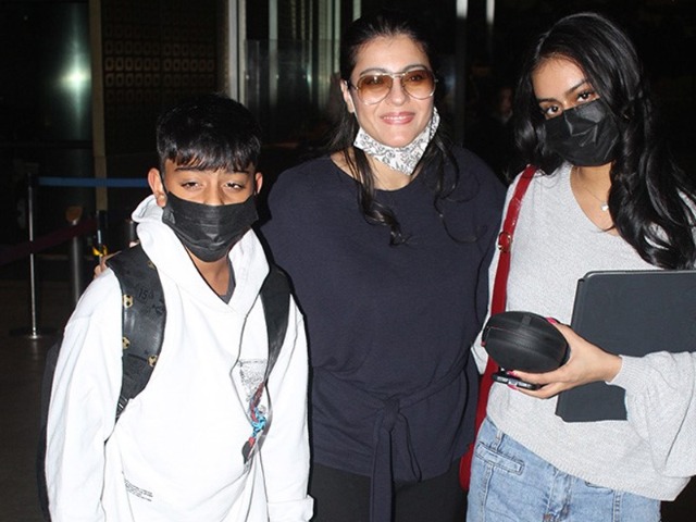 Kajol Poses With Kids Nysa And Yug At The Airport