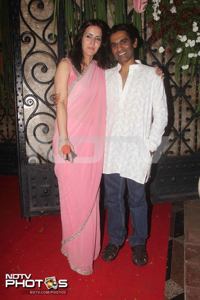 Actress Tulip Joshi looks lovely in a pink chiffon. Seen here with a friend.