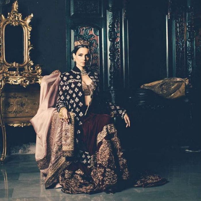 Here, Manish styled a <i>lehenga choli</i> with an embellished long jacket for Kangana. <br><br>This image was posted on Instagram by <a href="https://www.instagram.com/manishmalhotra05/" target="_blank" rel="nofollow" >Manish Malhotra</a>