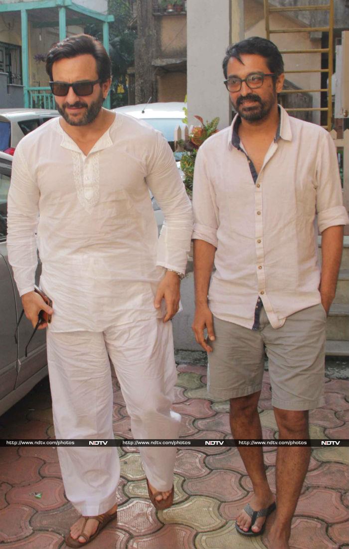 Saif Ali Khan looked handsome in white with <i>Chef</i> director Raja Krishna Menon.