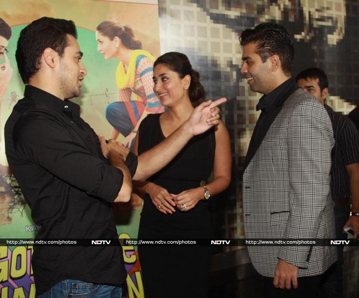 Karan Johar, who is producing the film shares a candid moment with his actors.