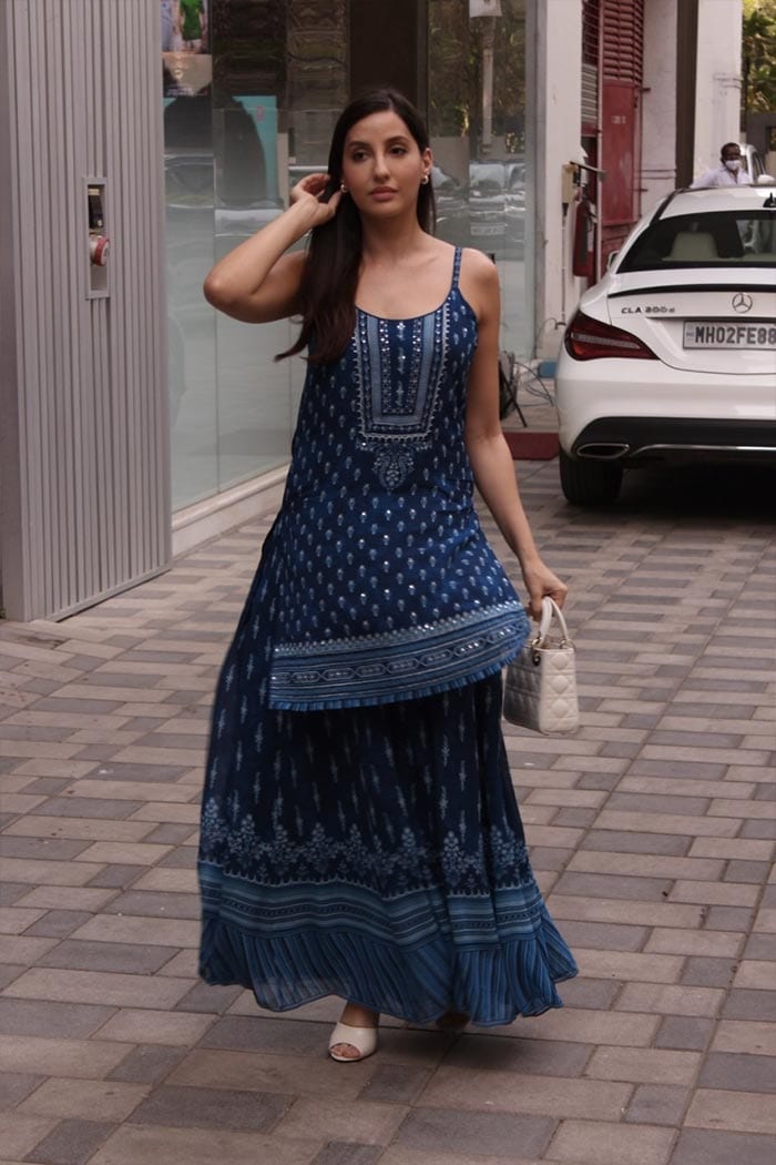 Nora Fatehi looked alluring in a traditional outfit as he posed for shutterbugs outside the Tseries office.