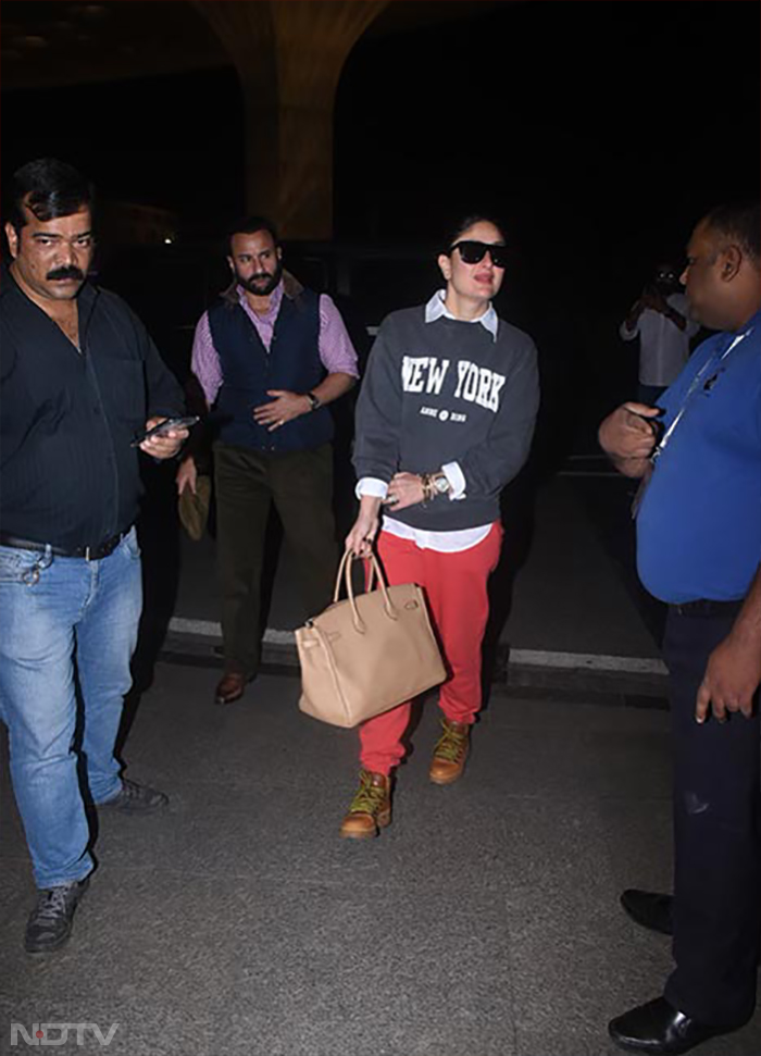 Kareena Kapoor and Saif Alia Khan were spotted with their sons Taimur and Jeh at the airport. (Image Courtesy: Varinder Chawla)