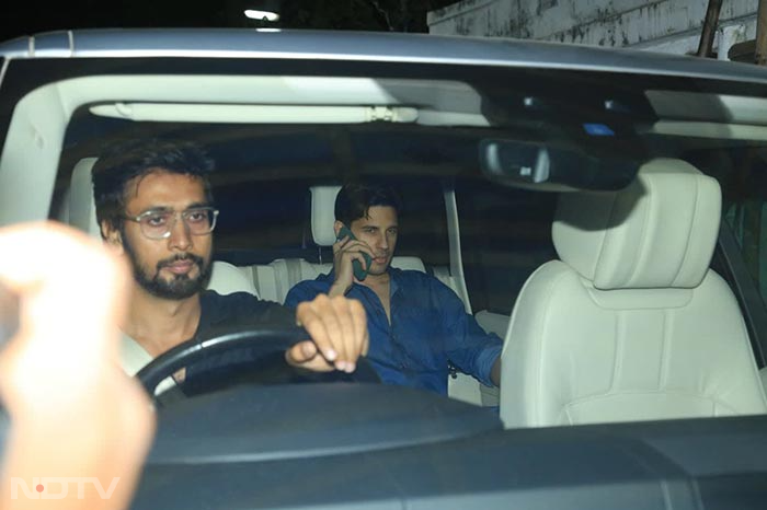 Sidharth Malhotra was clicked talking on a phone. (Image Courtesy: Varinder Chawla)