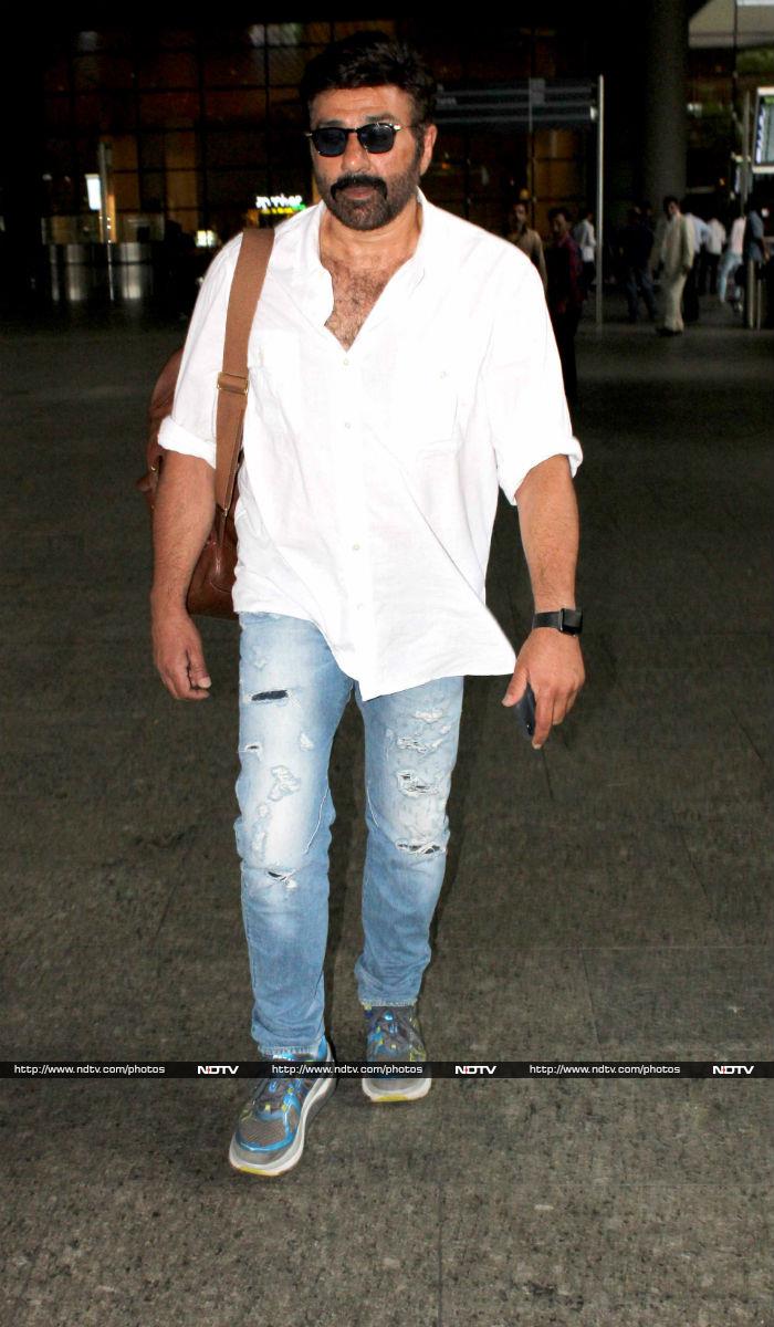 Actor Sunny Deol wore a classic white and blue combo.