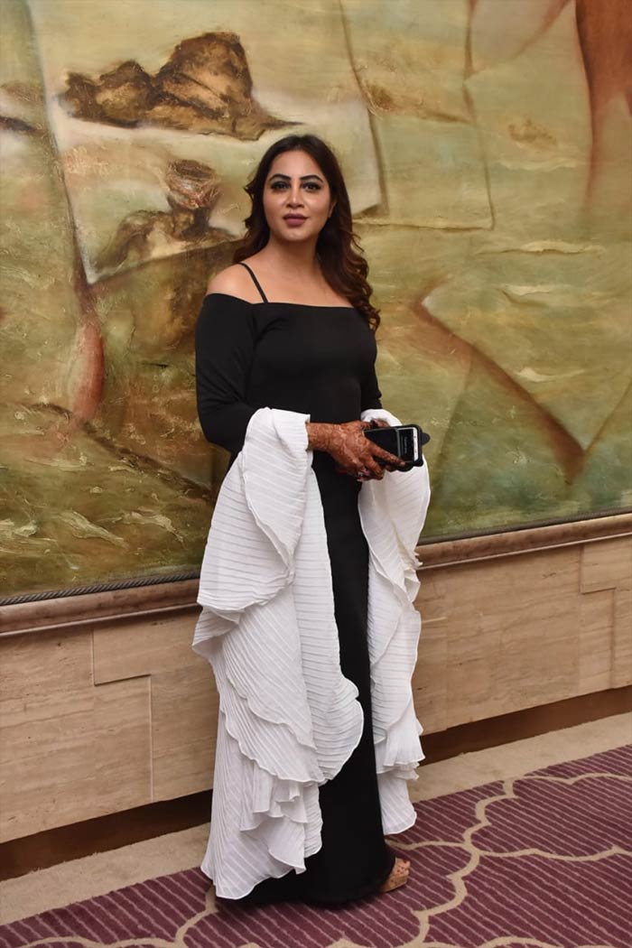 Arshi Khan posed happily for the shutterbugs as she arrived for an event in the city.