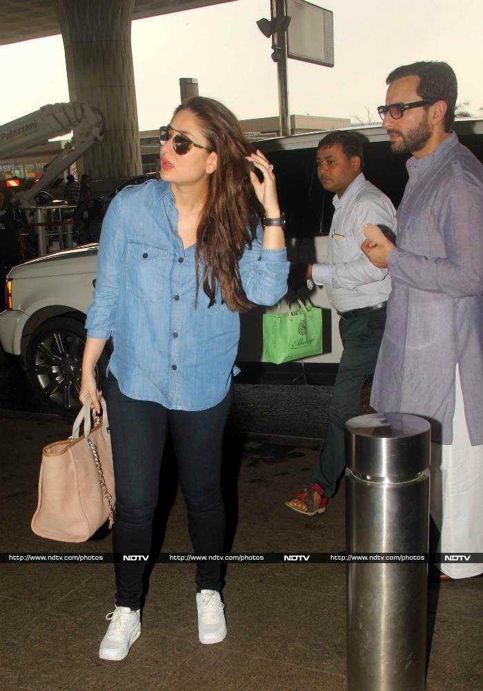 What A Sweetie. Saif Carries Kareena\'s Bag For Her At Airport