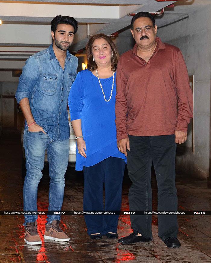 Kareena's aunt and Randhir Kapoor's sister Rima posed with son Aadar and her husband.