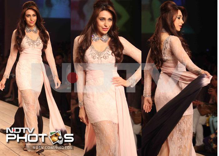 Karisma Kapur walked the ramp as showstopper for designer Shehla Khan's 'Boudoir' line at the ongoing Lakme Fashion Week. The actress was elegant in a lace creation with chiffon panels and gunmetal lace embroidery.