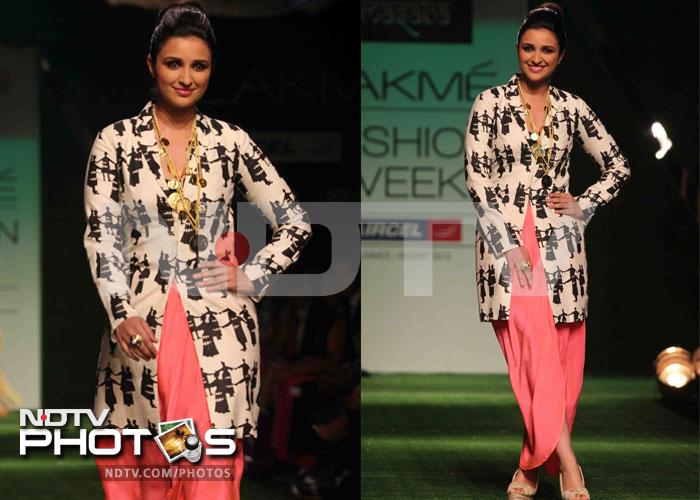 Chirpy as ever, Parineeti Chopra walked the ramp for Masaba. The <i>Ishaqzaade</i> actress looked stunning in a long white jacket with Masaba's signature prints teamed with a pink <i>dhoti</i>.