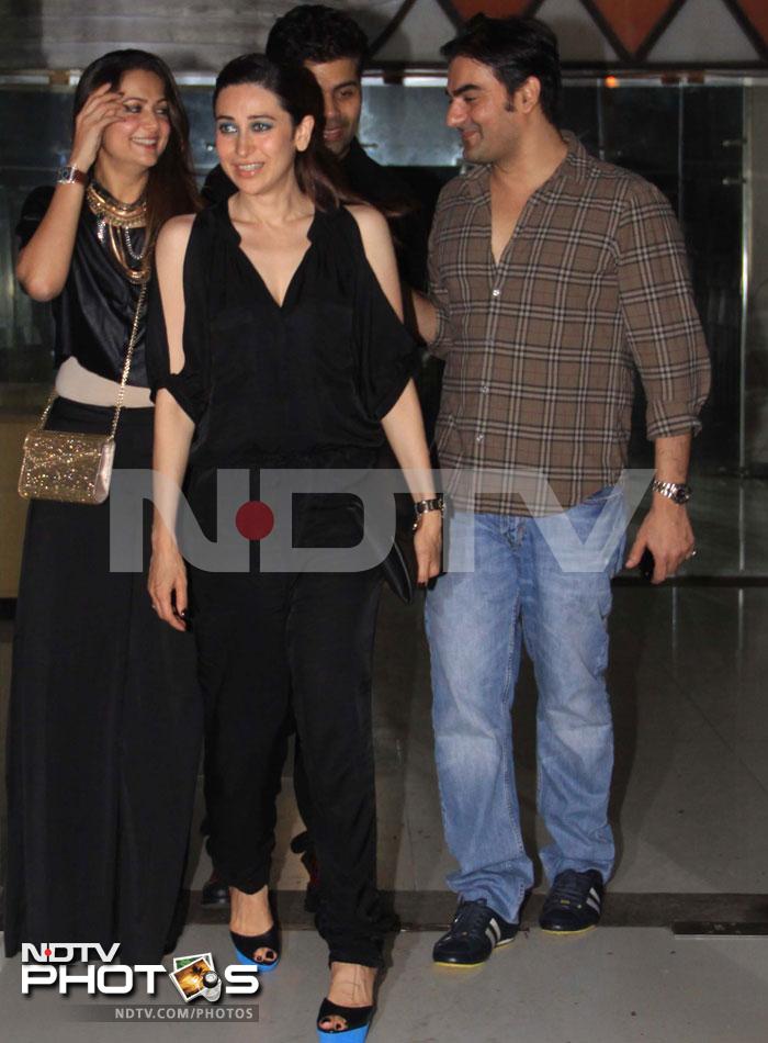 Karisma Kapur was in full party mode with friends Amrita Arora, Karan Johar and Arbaaz Khan when she was spotted at actor Sanjay Kapoor's residence in Mumbai on Wednesday (July 17, 2013).