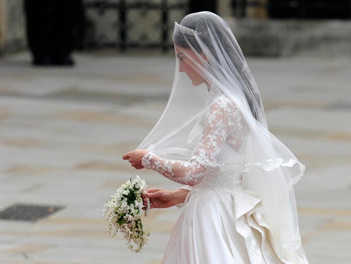 Kate wore her hair partly up, with a stunning tiara made in 1936.  Her hair was softly curled at the end.