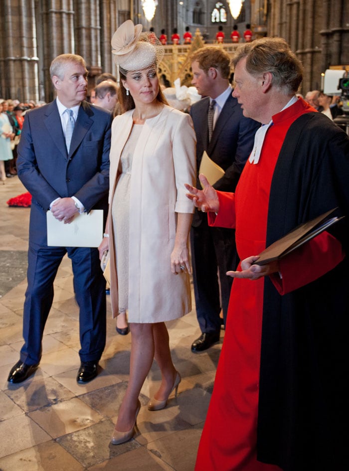 Kate carried off a graceful aura in a cream peach dress with a matching coat from British designer Jenny Packham and hat by Jane Taylor, showing off her baby bump, while Prince William was neat in blue.