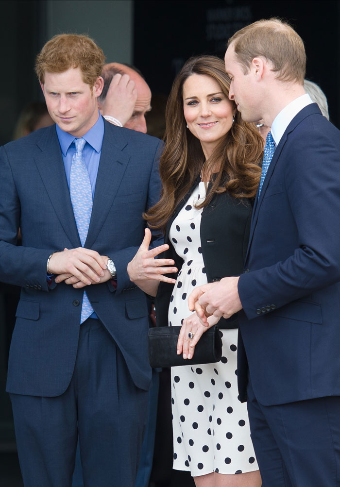 Six months pregnant Kate Middleton attended the inauguration of the Warner Bros Studios in Leavesden on April 26, 2013  with husband Prince William and brother-in-law Prince Harry. Her growing baby bump was clearly visible in a short white polka dotted dress worn with a short black blazer.