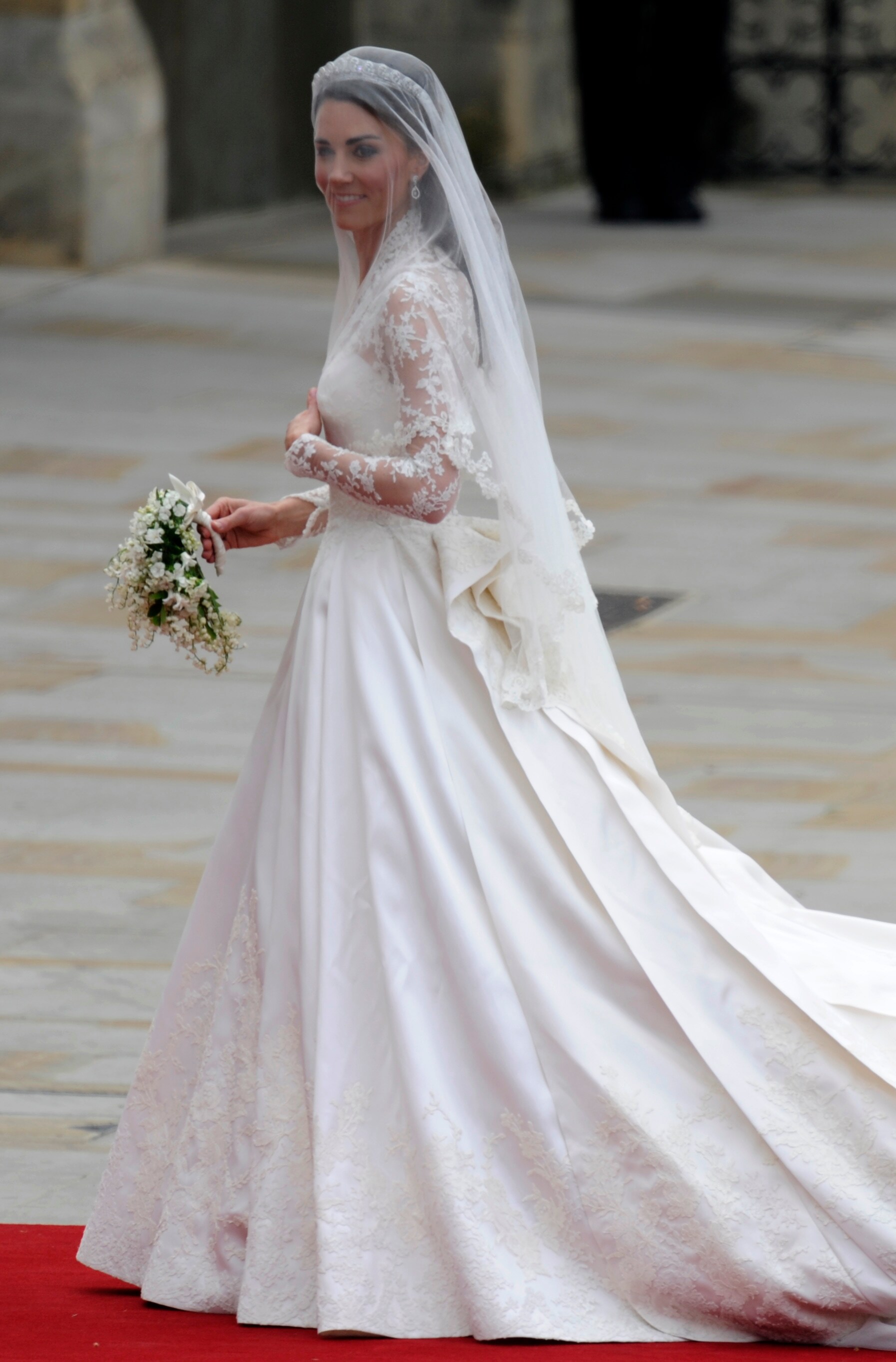 Kate wore her hair partly up, with a stunning tiara made in 1936. Her hair was softly curled at the end.