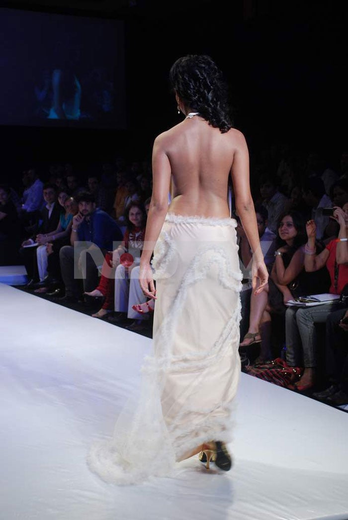 Former Miss India and actress Sayali Bhagat walks the ramp.