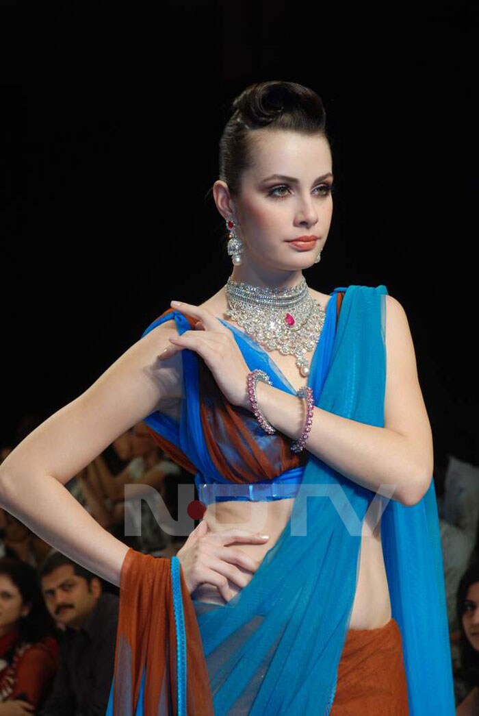 A model walks the  ramp.