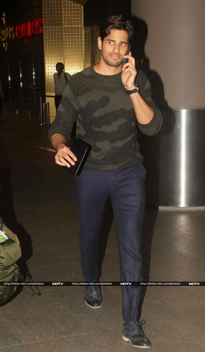 Katrina's <i>Baar Baar Dekho</i> co-star Sidharth Malhotra paired ink-blue pants and a camouflage tee.