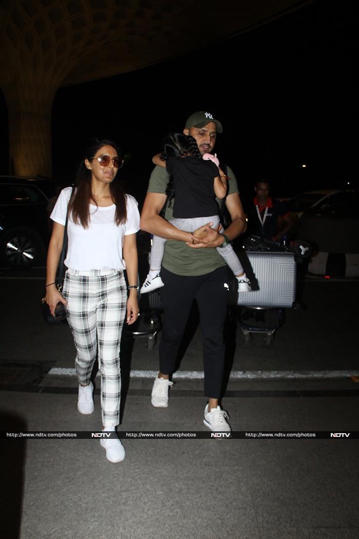 Cricketer Harbhajan Singh was spotted at the airport with his wife Geeta Basra and daughter Hinaya Heer Plaha.