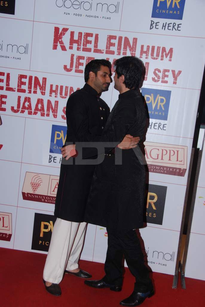 Harman Baweja and Abhishek Bachchan share a hug.