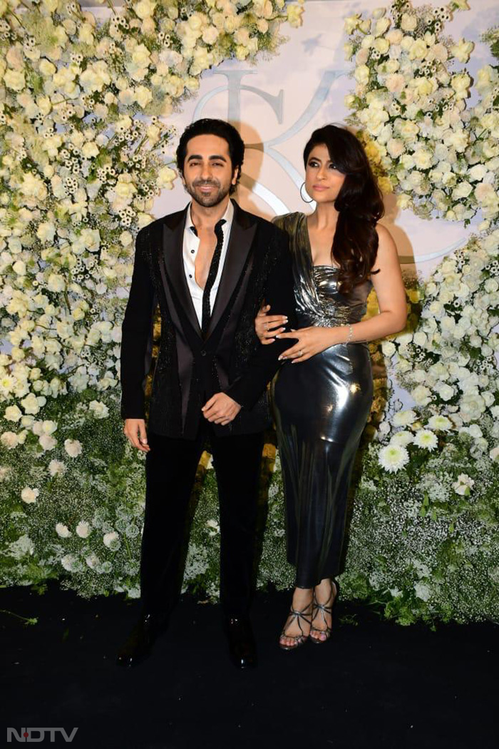 Ayushmann Khurrana and wife Tahira Kashyap gave couple goals as they posed for the camera at Sidharth-Kiara's wedding reception party. (Image Courtesy: Varinder Chawla)