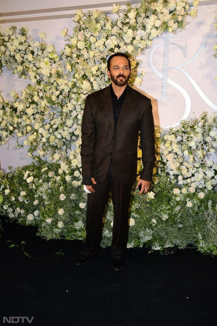<i> Golmaal </i> director Rohit Shetty looked dapper in a suit at Sidharth-Kiara's wedding reception party. (Image Courtesy: Varinder Chawla)