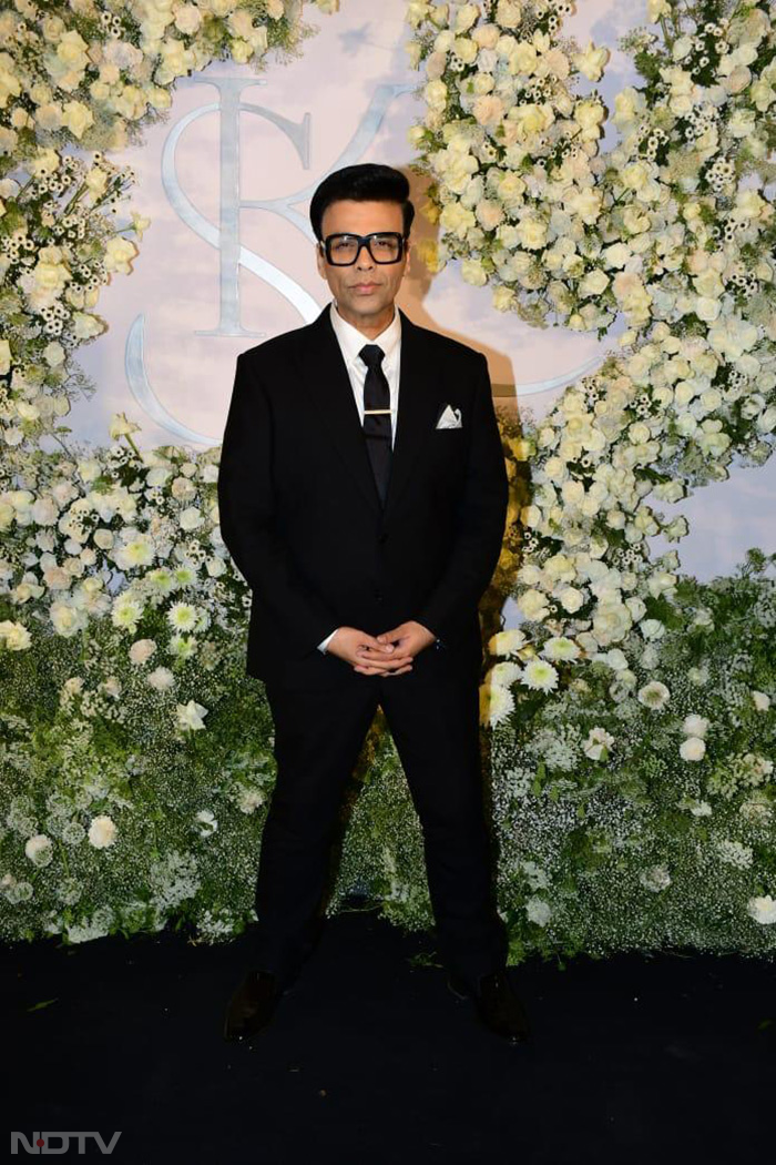 Karan Johar posed in style at Sidharth-Kiara's wedding reception party. (Image Courtesy: Varinder Chawla)