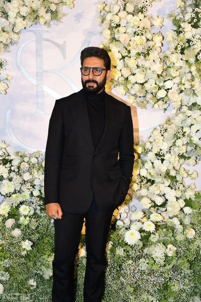 Abhishek Bachchan was clicked in a black suit at Sidharth-Kiara's wedding reception.(Image Courtesy: Varinder Chawla)