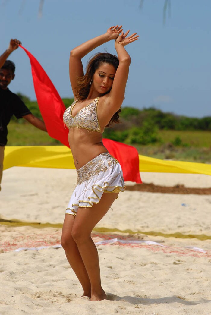 Actress Kim Sharma, who plays a bar girl in the upcoming Telugu flick <I>Yagam</I>, will be seen in a bikini in the movie.