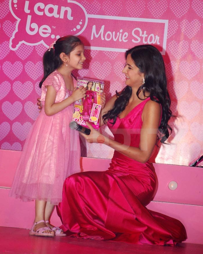 Kat channels pink girl power here with her little friend.