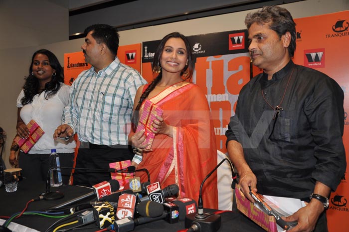 The gorgeous lady stands next to Vishal Bhardwaj.