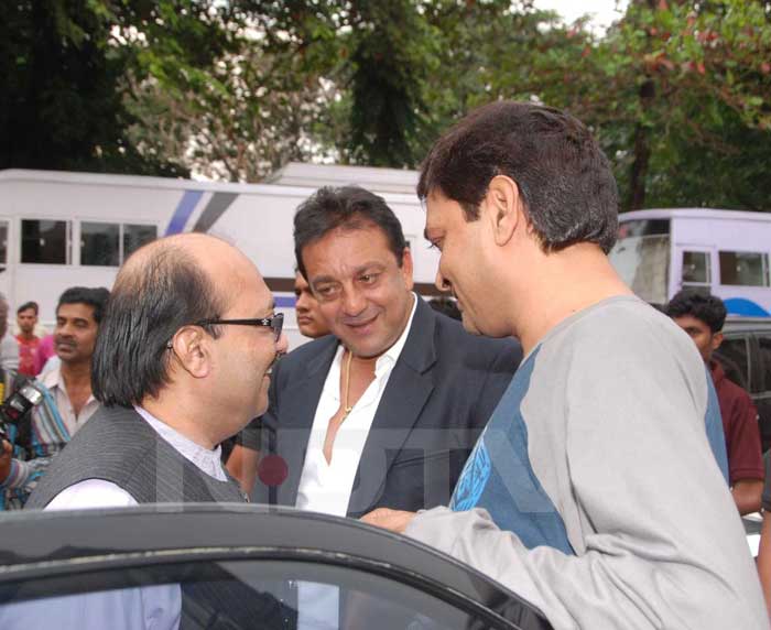 Sanjay Dutt and Amar Singh share a light moment with a friend.