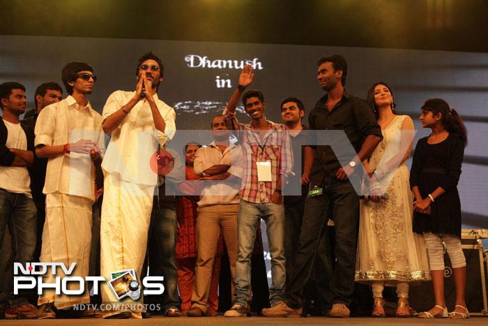 Dressed in traditional attire Dhanush says 'Namaste' to the audience.