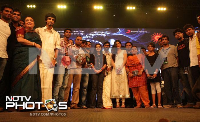 Friends and family with the cast and crew of <i>3</i> on stage.