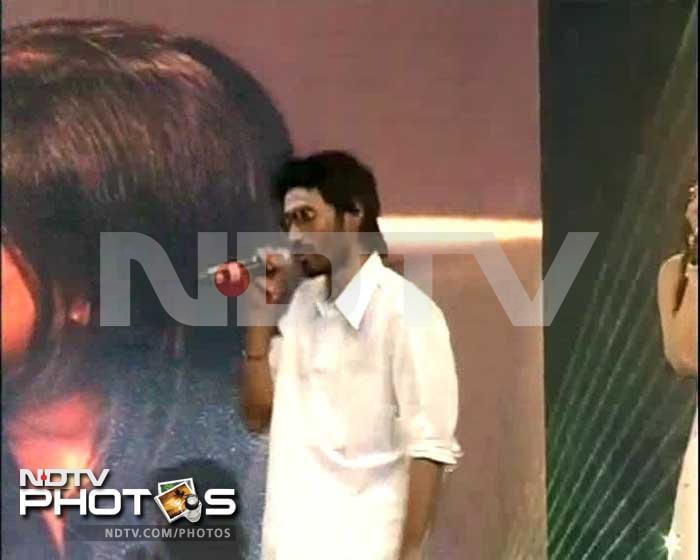 Tamil star Dhanush, also sang a tweaked version of his hit Tamil-English song <i>Why This Kolaveri Di</i>, dedicated to Amitabh Bachchan at an award function in Mumbai recently, leaving the megastar highly impressed.