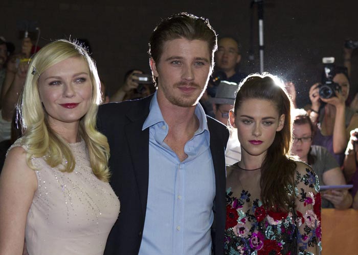 In July, Kristen Stewart admitted to having an affair with 41-year old director Rupert Sanders. That announcement had a rippling effect, putting an end to her romantic relationship with <i>Twilight</i> star Robert Pattinson.<br><br>Seen here with 
with co-stars Kirsten Dunst and  Garrett Hedlund.