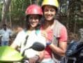Photo : Riteish rides pillion with Genelia in Goa