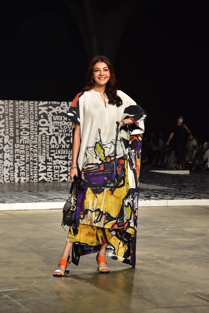 Actress Kajal Aggarwal also walked the ramp for Anamika Khanna. She looked pretty in a colourful kaftan-style satin dress.