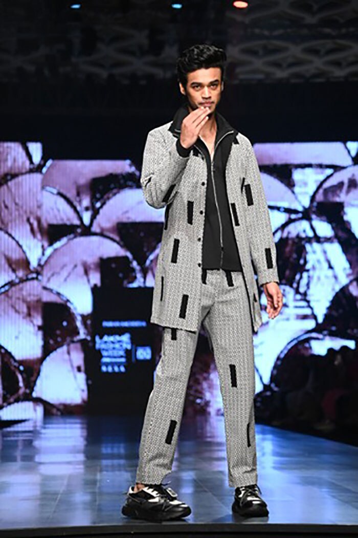 Irrfan Khan's son Babil made his runway debut. He walked the ramp for Pawan Sachdeva.
(Image courtesy: Varinder Chawla)