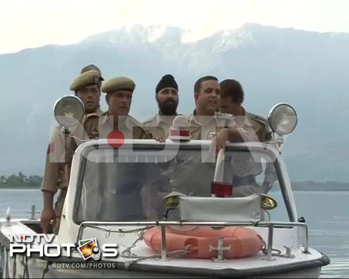 A boat of security personnel travelled with the cavalcade of boats.