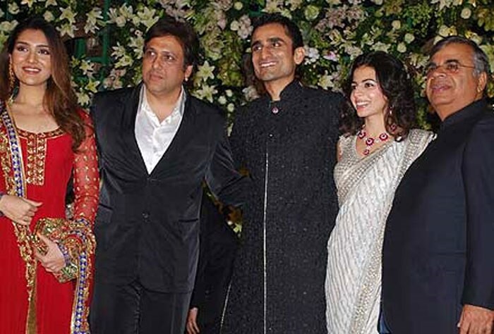 <B>Ambika Hinduja</B>: Ambika Hinduja and Raman Macker tied the knot at the Turf Club in Mumbai. Ambika was dressed in a pretty white saree by Abu-Sandeep with matching diamond-studded jewellery, while Raman looked dapper in a black designer sherwani with white embroidery. The guest list included Vilasrao Deshmukh with Riteish, Praful Patel with family, Gautam and Nawaz Singhania, Yash and Avanti Birla, Mahesh and Haseena Jethmalani, Kumar Mangalam Birla, Adi Godrej, Maureen Wadia, Amar Singh, and Govinda among many others.