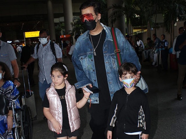 London Vacation Done, Karan Johar Arrives In Style With His Kids Yash And Roohi London Vacation Done, Karan Johar Arrives In Style With His Kids Yash And Roohi