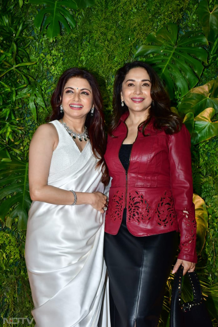 Madhuri Dixit and Bhagyashree were all smiles as they posed together at the party. (Image courtesy: Varinder Chawla)