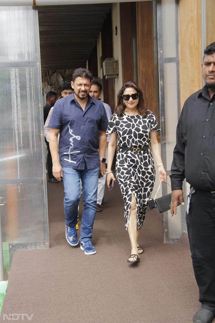 Madhuri Dixit stepped out with her husband Shriram Nene for a Sunday lunch. (Image Courtesy: Varinder Chawla)