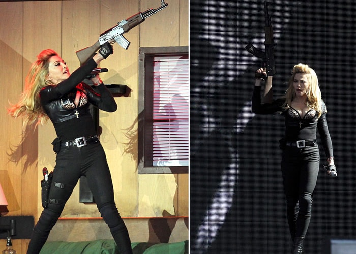 Madonna defies cops, Hung Up on fake guns