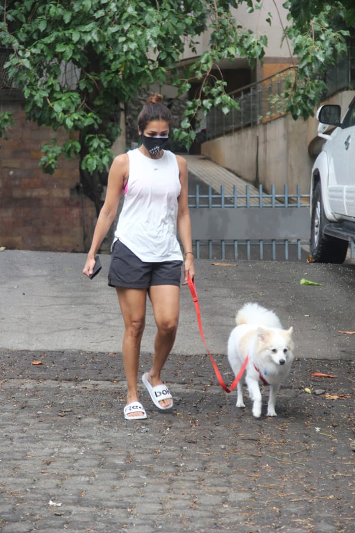 Actress Malaika Arora was on Thursday spotted taking a walk with her dog in Bandra.