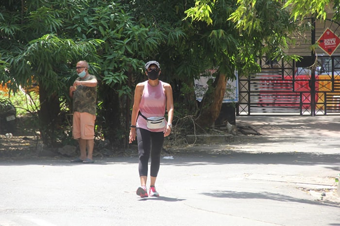 Mandira Bedi was photographed taking a walk near her residence in Bandra.