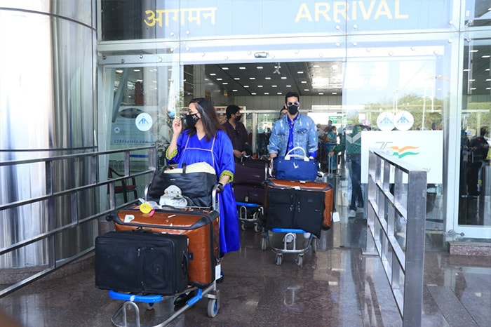 Neha Dhupia and husband Angad Bedi were spotted at the Jaipur airport.