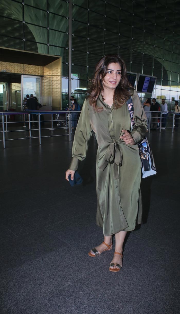 Raveena Tandon was also clicked at the airport. However, it was not clear if Raveena was also headed to the wedding in Rajasthan.